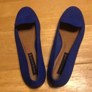 Steve Madden slip ons.